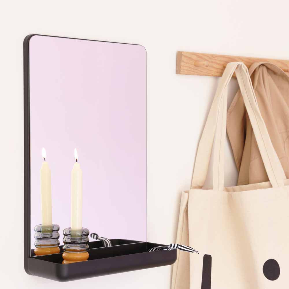 Mirror with a black shelf
