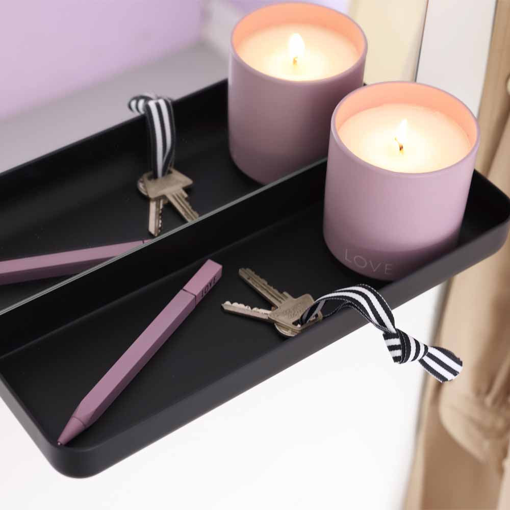 Mirror with a black shelf