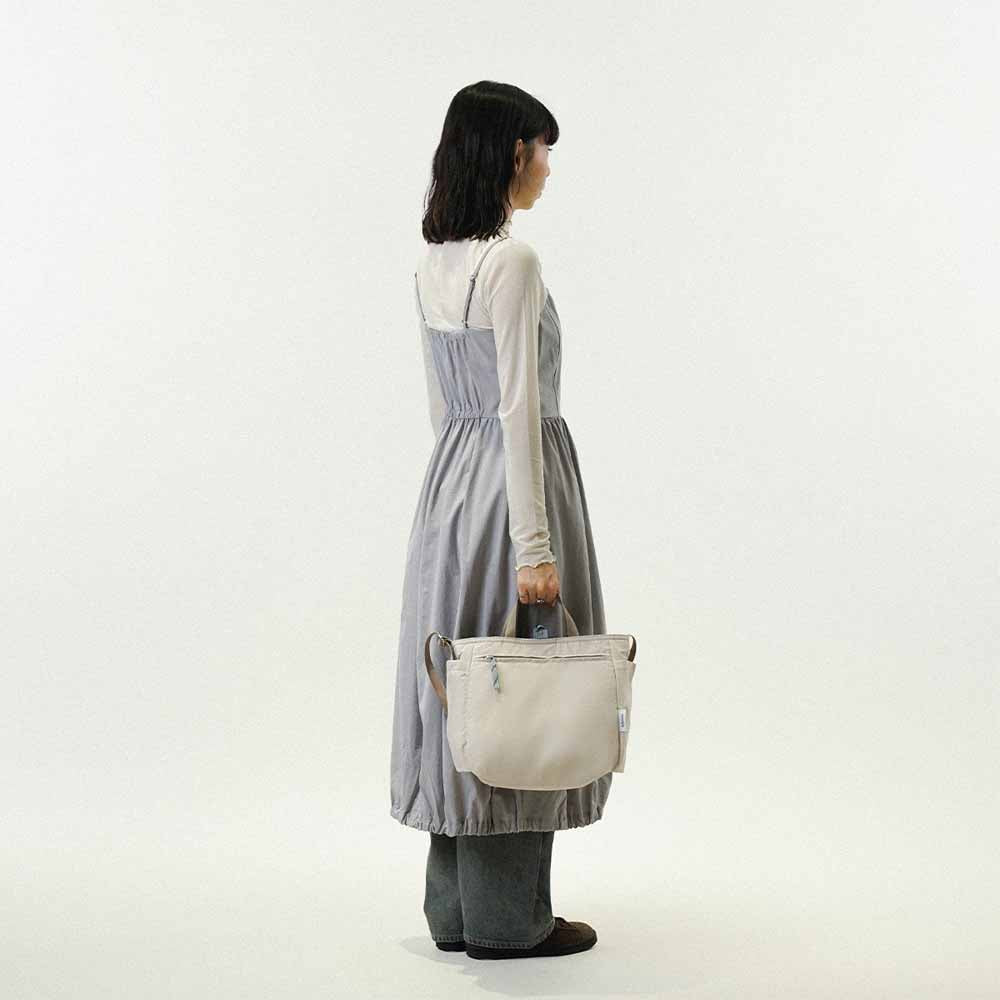 תיק צד דו צדדי תכלת פסים / בז NIKO