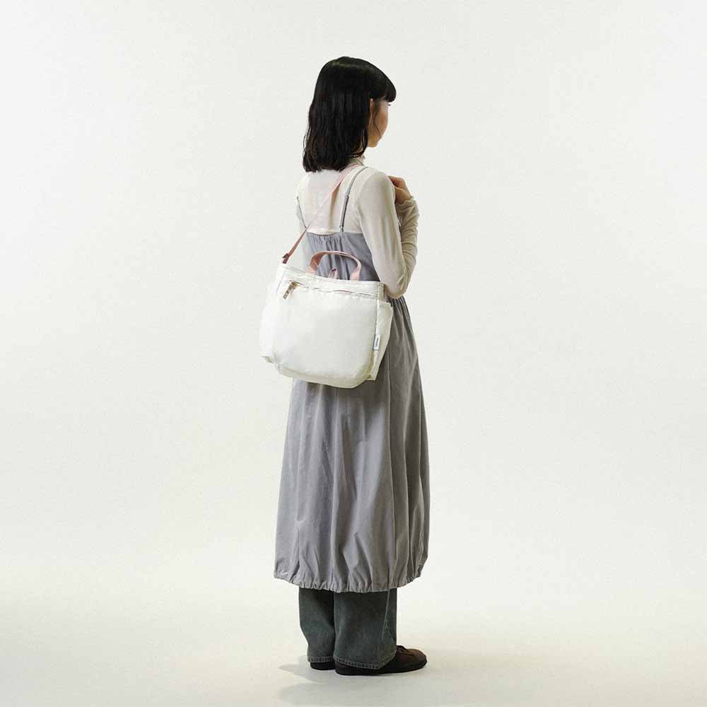 דו צדדי ורוד משובץ / בז NIKO תיק צד