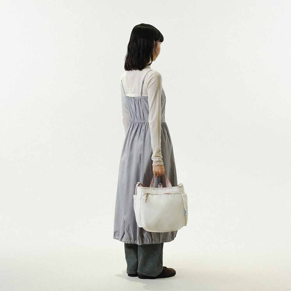 דו צדדי ורוד משובץ / בז NIKO תיק צד