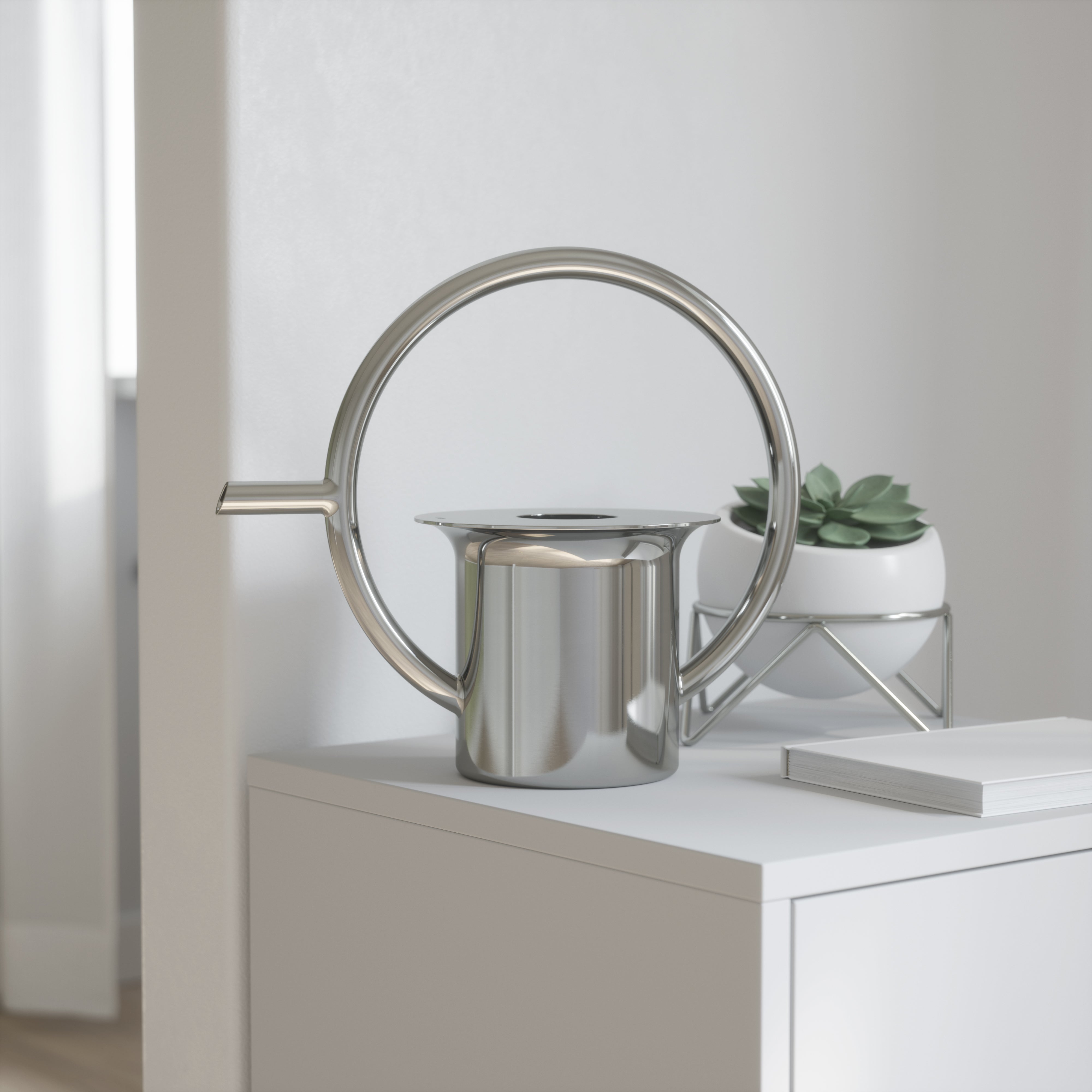 כלי להשקיית עציצים כסוף