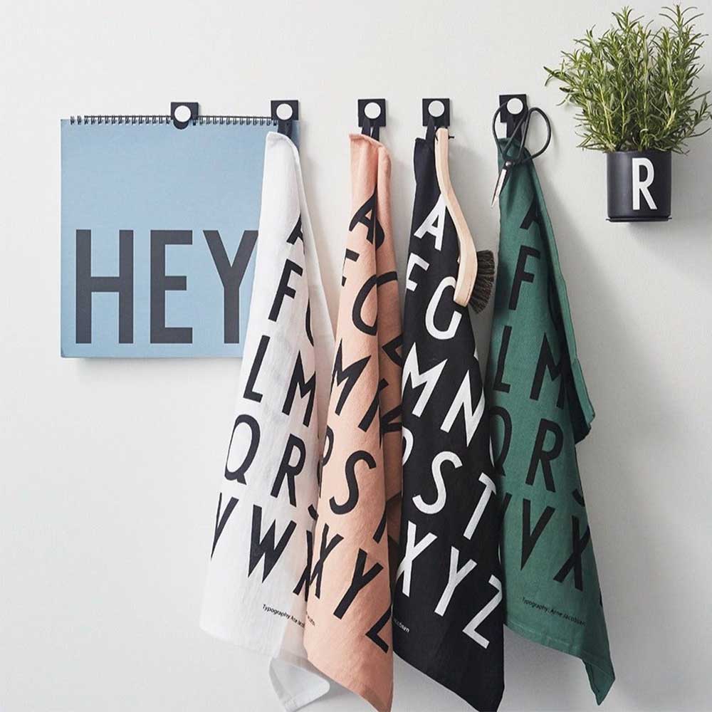 Two ABC cream tea towels