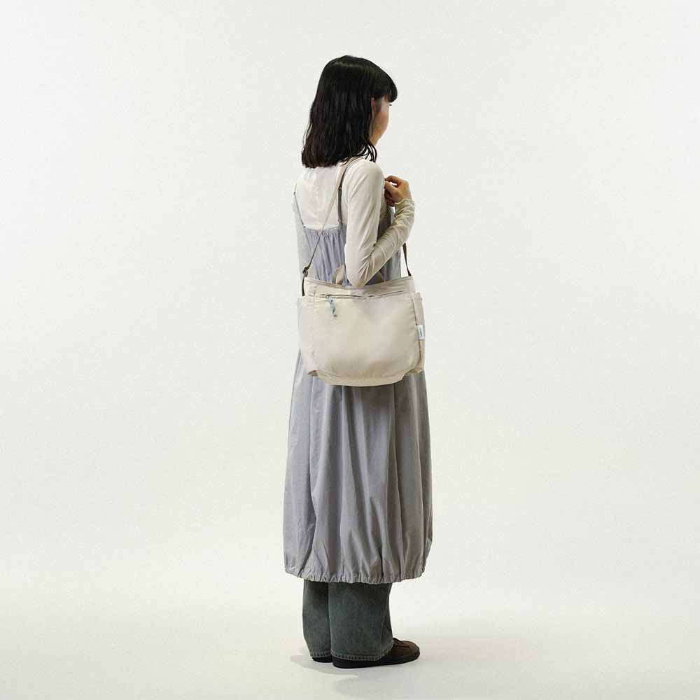 תיק צד דו צדדי תכלת פסים / בז NIKO