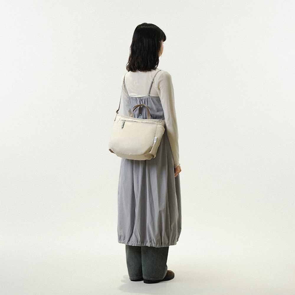 תיק צד דו צדדי תכלת פסים / בז NIKO