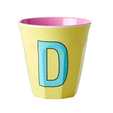 כוס טוטון D תכלת רקע צהוב